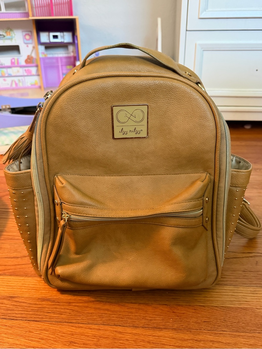 Itzy Ritzy Tan Faux Leather Diaper Backpack